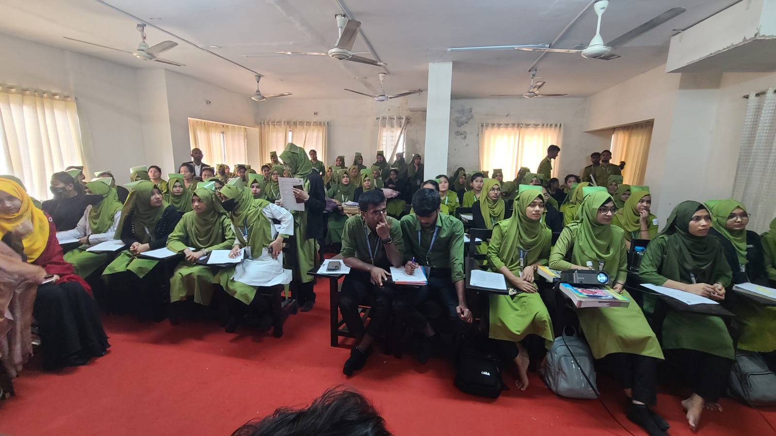 A full classroom of MLI students
