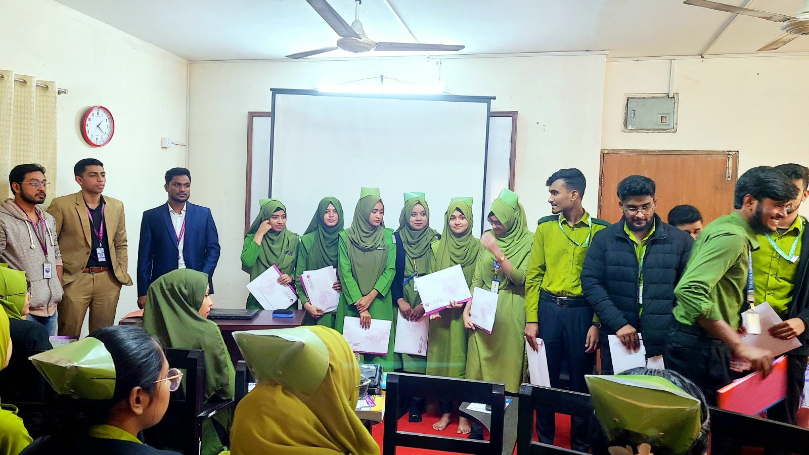 Students receiving course certificates